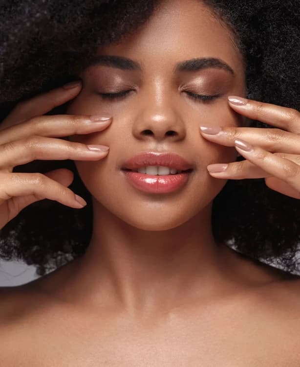 Client receiving a calm, medical-grade facial treatment at Radiance