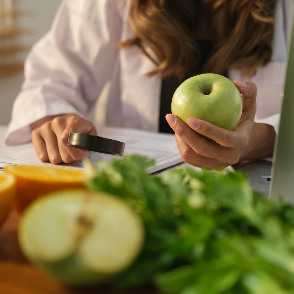 Dietitian in Hamilton showing healthy food options
