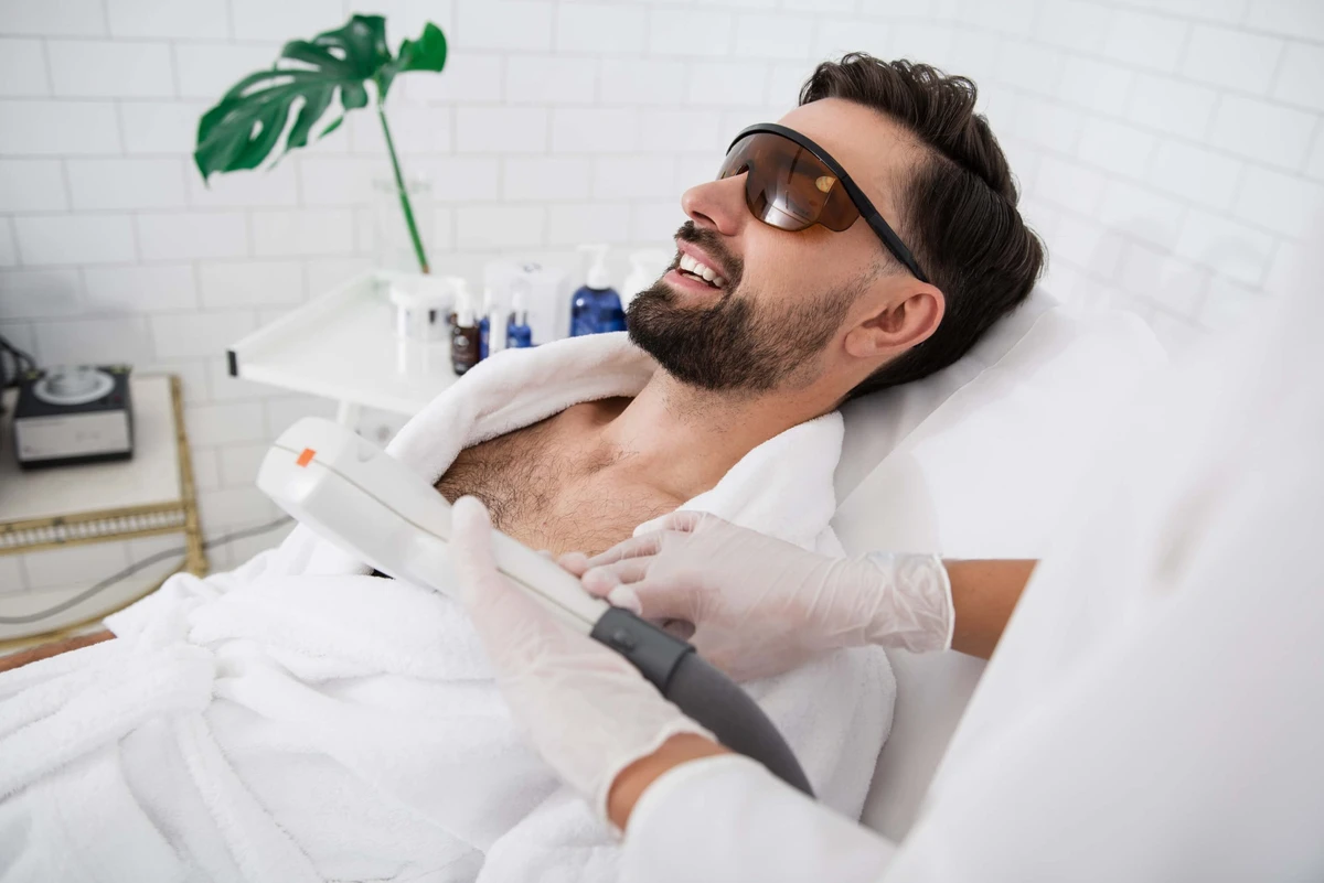 Man receiving chest laser hair removal in Hamilton